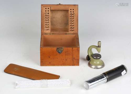 A collection of watchmaker's tools and scientific instrument...