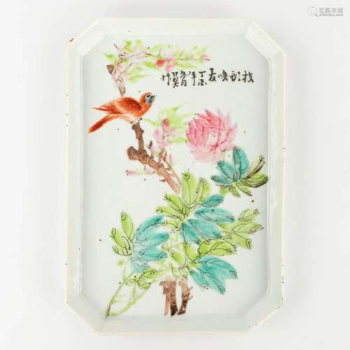 A Chinese porcelain bowl, decorated with fauna and flora. 19...