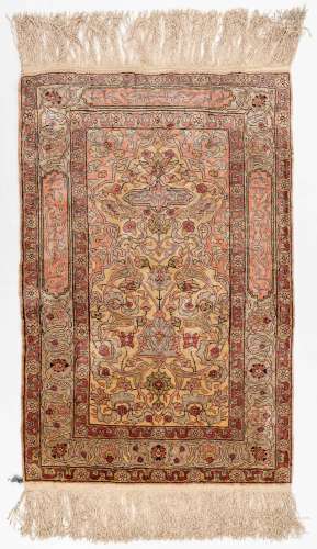 An Oriental hand-made carpet, silk. Hereke. (L: 60 x W: 92 c...