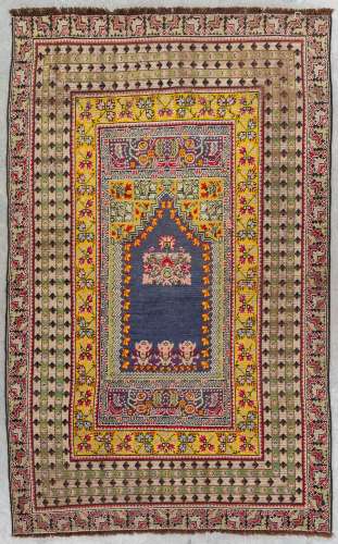 An Oriental hand-made carpet, Oushak, Turkey. (L: 230 x W: 1...