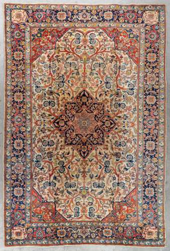 An Oriental hand-made carpet, Iran, Tabriz. (L: 290 x W: 200...