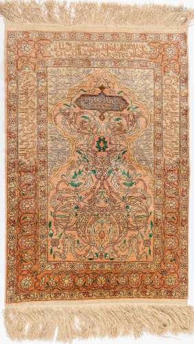 An Oriental hand-made carpet, silk, Hereke. (L: 95 x W: 63 c...