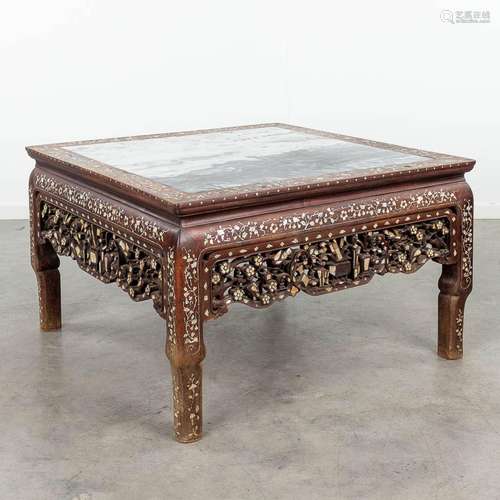 A Chinese coffee table, decorated with mother of pearl, blac...