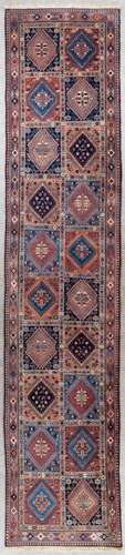 An Oriental hand-made runner, Kurdish, Iran. (L: 380 x W: 80...