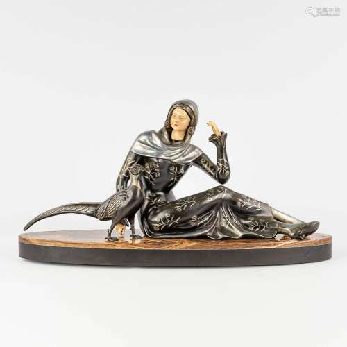 Lady with a pheasant, a figurative art deco statue, onyx and...
