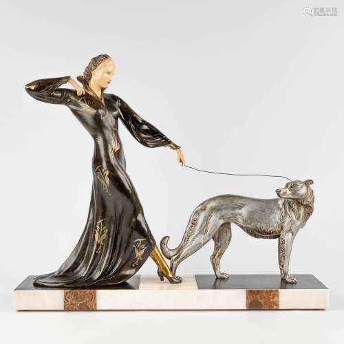 Lady walking her dog, a statue in art deco style. Onyx and s...