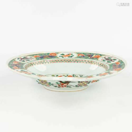 A Chinese shaving bowl, Famille Verte, and decorated with fa...