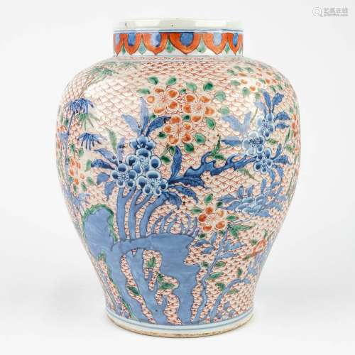 A Chinese vase with underglaze blue and overglaze red decor....