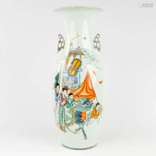 A Chinese vase with image of a mythological figurine and lad...