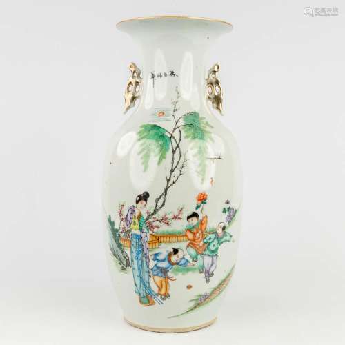 A Chinese vase decorated with playing children and ladies. 1...