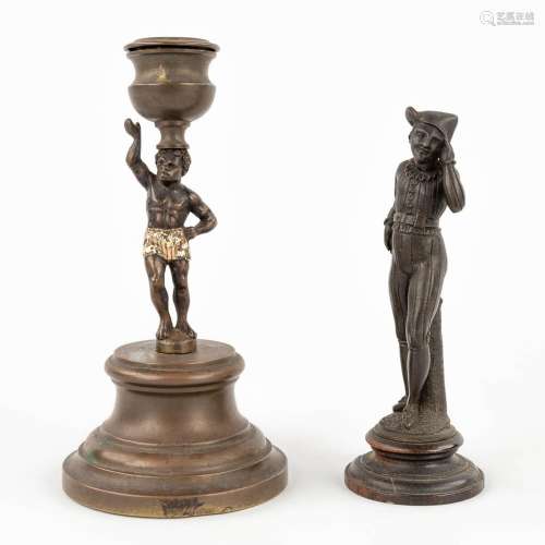 A Jester figurine and candle holder, made of bronze. 19th C....