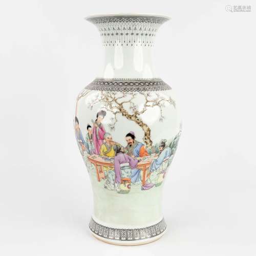 A Chinese vase decorated with a musical scène and an Emperor...