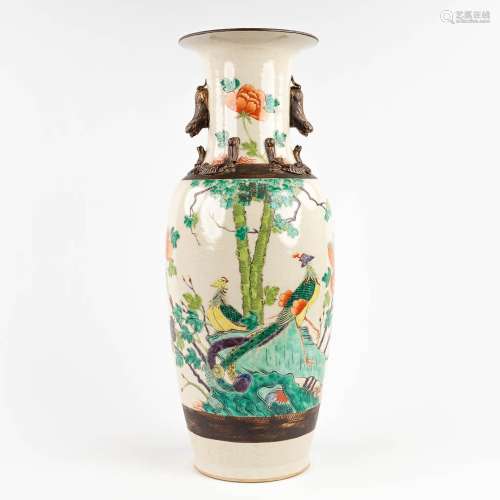 A Chinese vase, Nanking Stoneware, decorated with Phoenixes ...