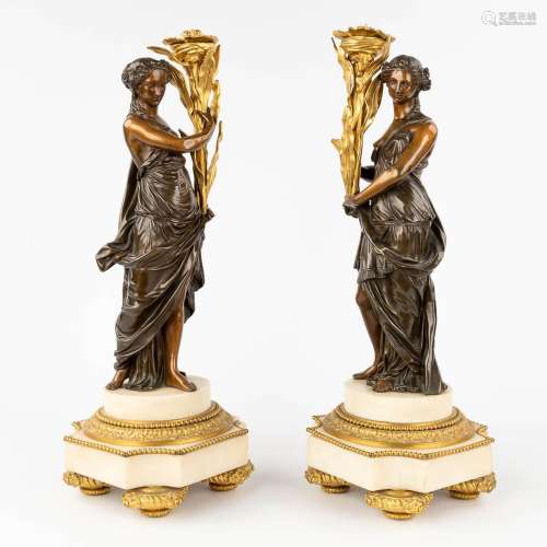A pair of neoclassical figurines, gilt and patinated bronze ...