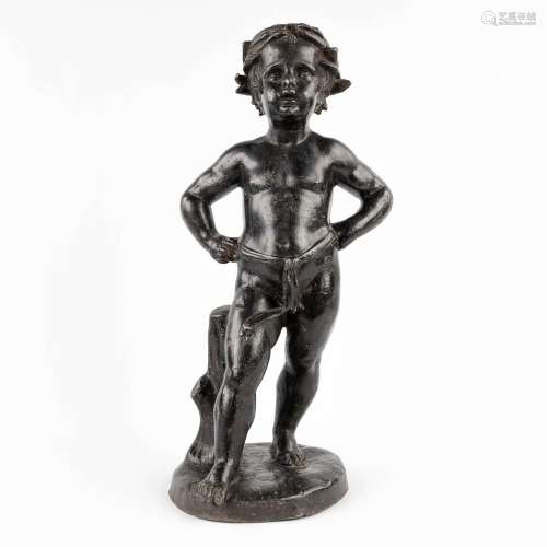 A figurine of a boy, patinated lead. circa 1900. (H: 56 cm)