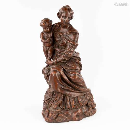 Madonna with child and angels, a figurine made of plaster. (...