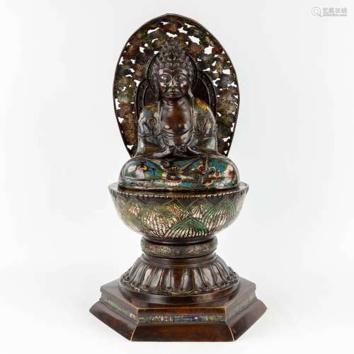 Guanyin on a lotus flower, patinated bronze finished with ch...