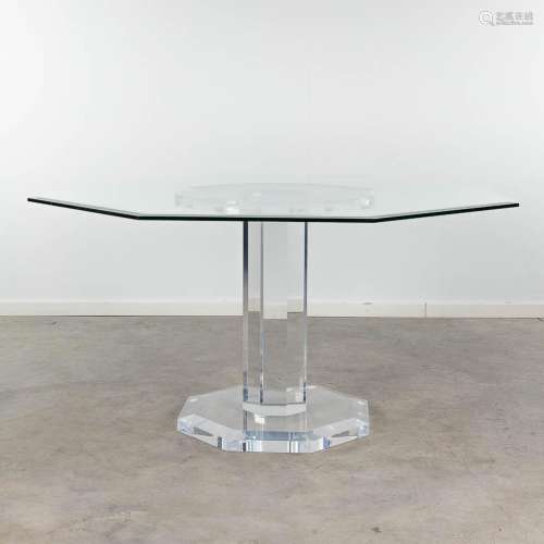 An octagonal, glass and acrylic dining room table, circa 198...
