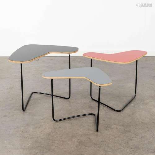 A set of 3 side tables with black, red and grey Formica on a...