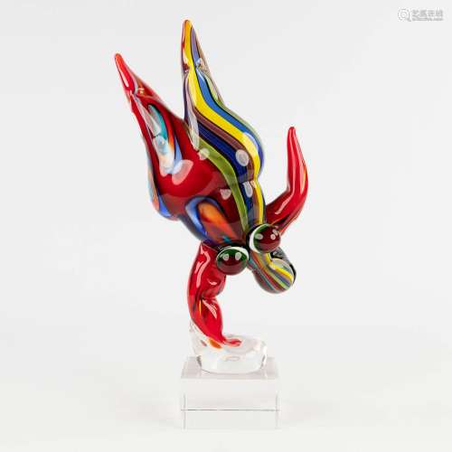 A glass figurine, in the style of Niki The Saint Phalle, pro...