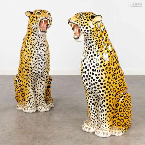 A pair of leopards, glazed stoneware. Made in Italy, circa 1...