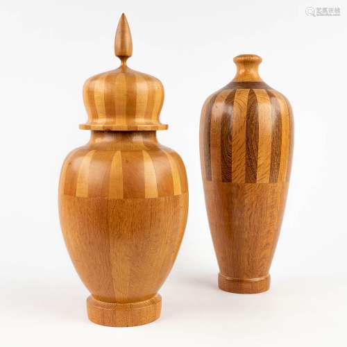 A collection of 2 wood-turned vases, made of wood. circa 196...