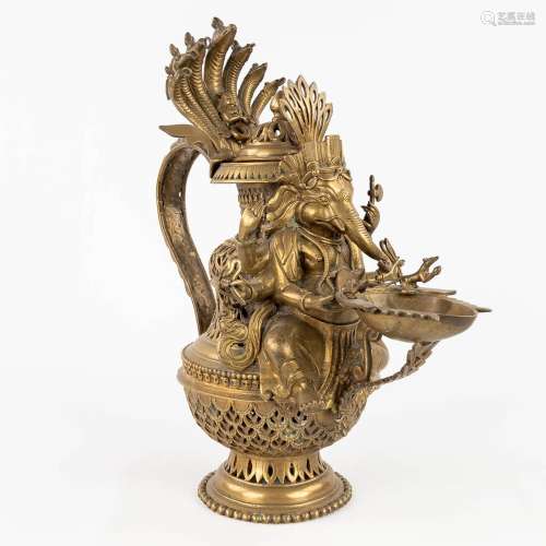 An incense burner made of bronze, decorated with a Ganesha f...