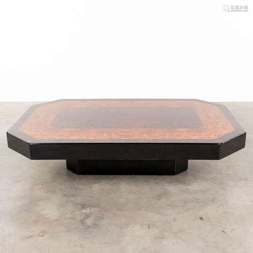 A coffee table finished with lacquered burlwood veneer. (L: ...