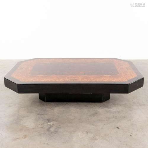 A coffee table finished with lacquered burlwood veneer. (L: ...