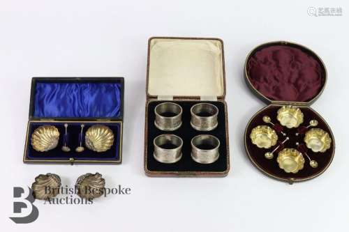 A boxed set of four silver napkin rings dated 1899 mm George...