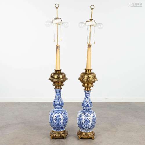 A pair of table lamps, made of a Delft's blue vase mounted w...