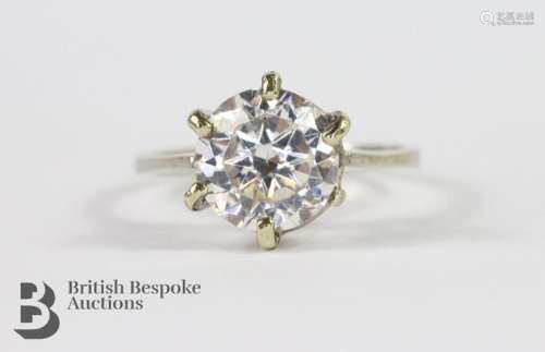 A 9ct white gold and white sapphire ring