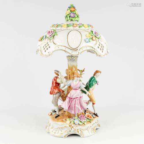 A porcelain table lamp with dancing figurines, marked PMP 18...