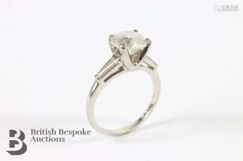 18ct white gold solitaire diamond ring. The ring set with a ...