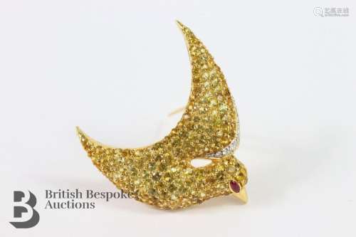 18ct yellow sapphire and diamond brooch. The pave-set brooch...