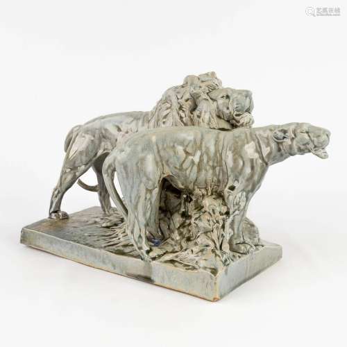 Josuë DUPON (1864-1935) 'Lion and Lioness' made of glazed fa...