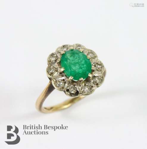 9ct yellow gold diamond and emerald ring. The emerald measur...