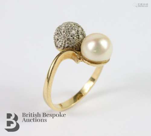18ct yellow gold diamond and pearl ring. The ring set with a...