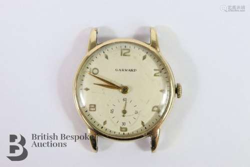 Gentleman's 9ct gold Garrard wrist watch. The watch having a...