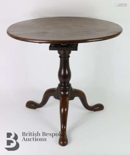 Two 19th century mahogany wine tables. The first having a ti...