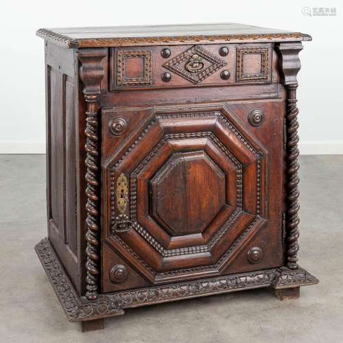 An antique 'Confiturier' cabinet, sculptured oak and walnut....