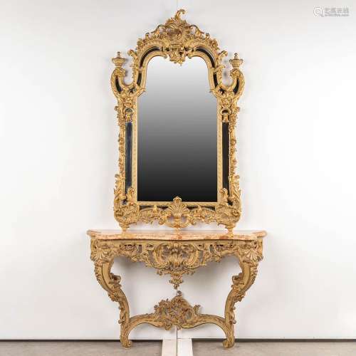 An antique, wood sculptured, console with a mirror. 1848. (W...