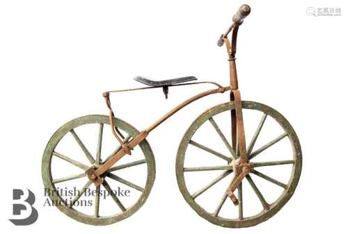 A child's velocipede boneshaker bicycle