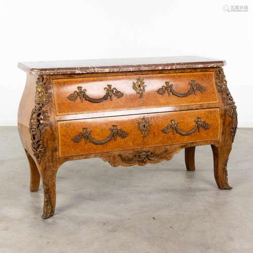 A two-drawer commode mounted with bronze and a marble top. 2...