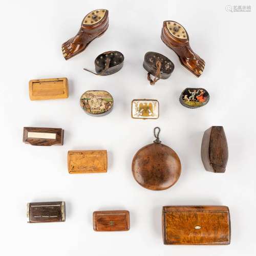 A collection of 15 snuff boxes, wood, porcelain and leather....