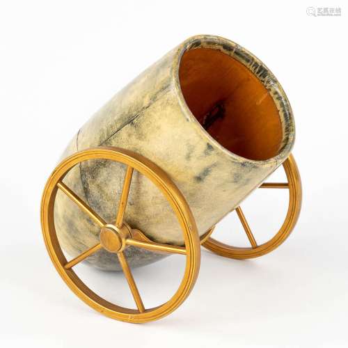 A cigar holder in the shape of a canon. Leather and horn, 20...
