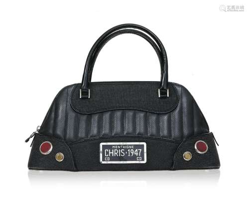 Christian Dior, sac Bowling Montaigne en cuir noir matelassé...