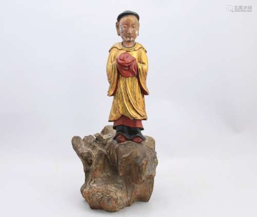 Chine, vers 1900. Groupe sur un rocher  en bois sculpté et p...