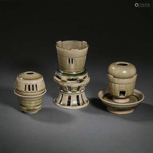 A SET OF CELADON TEA SETS FROM XIANGZHOU WARE IN CHINA'S SUI...