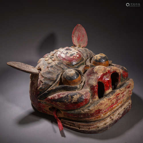 A Tibetan Carved Wooden Mask